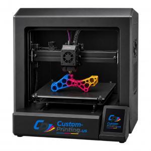 Enclosed desktop 3D printer printing a colorful honeycomb plastic part on the build plate, Custom-Printing.us branding